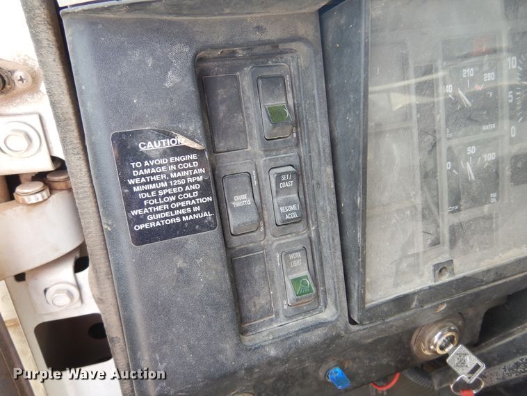 image for item DK0833 2000 International 4700  dump flatbed truck