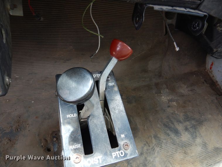 image for item DK0833 2000 International 4700  dump flatbed truck