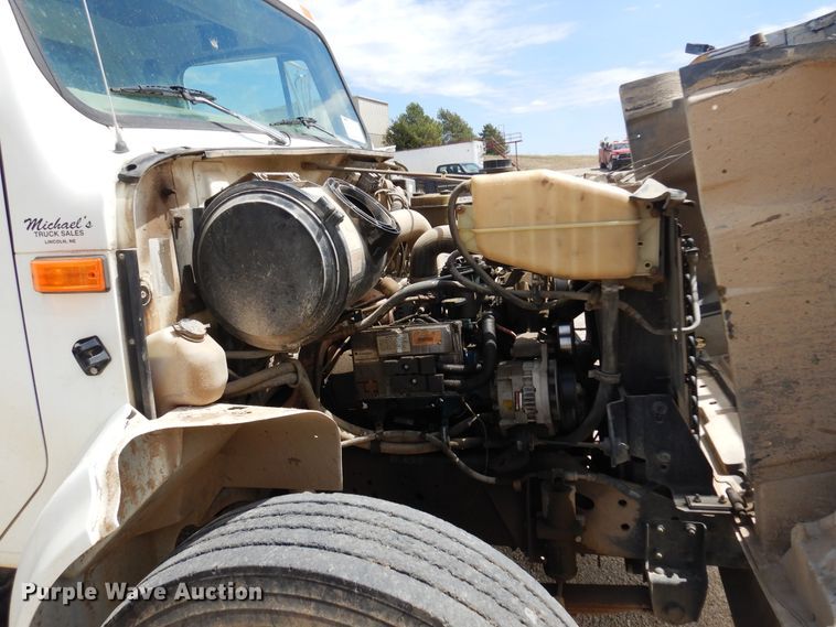 image for item DK0833 2000 International 4700  dump flatbed truck