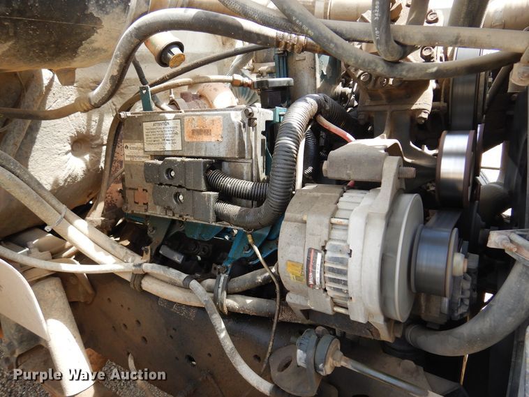 image for item DK0833 2000 International 4700  dump flatbed truck