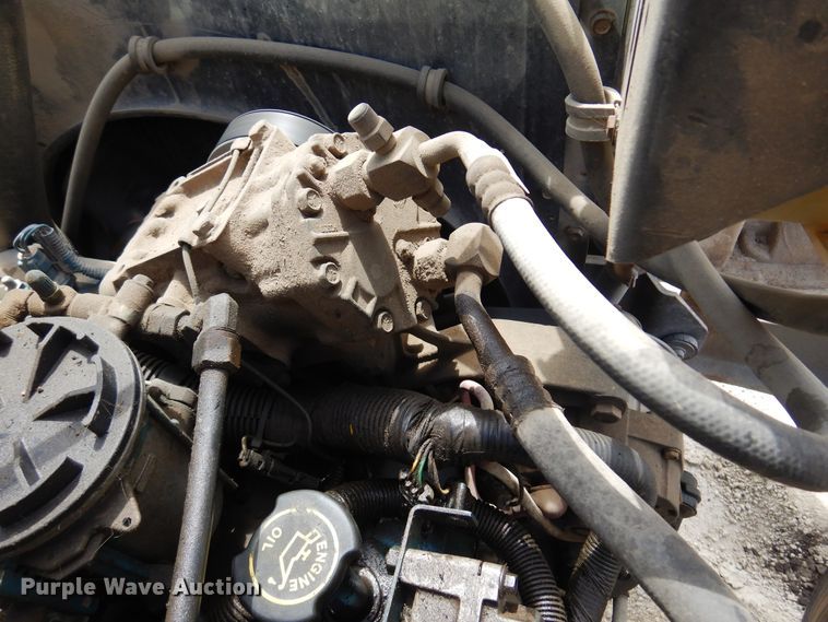 image for item DK0833 2000 International 4700  dump flatbed truck