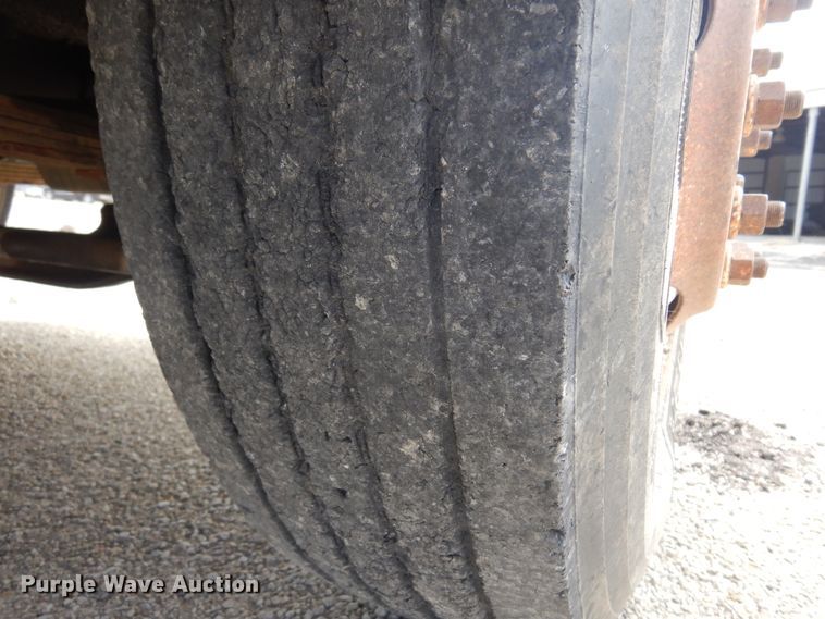 image for item DK0833 2000 International 4700  dump flatbed truck