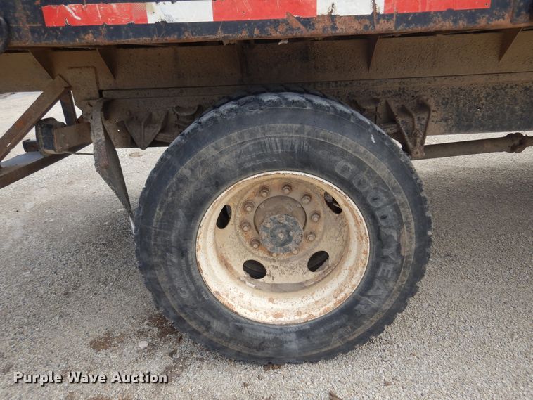 image for item DK0833 2000 International 4700  dump flatbed truck