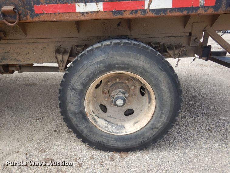 image for item DK0833 2000 International 4700  dump flatbed truck