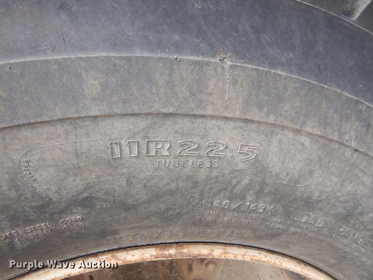 image for item DK0833 2000 International 4700  dump flatbed truck