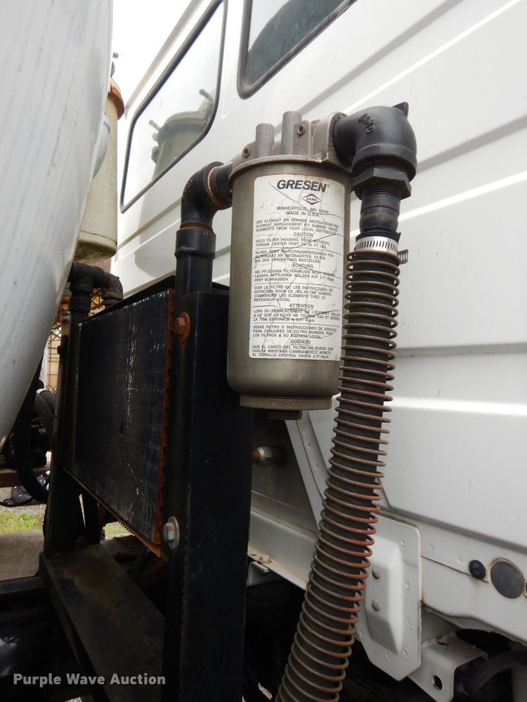 image for item DN1536 2000 Freightliner FL80  vacuum truck