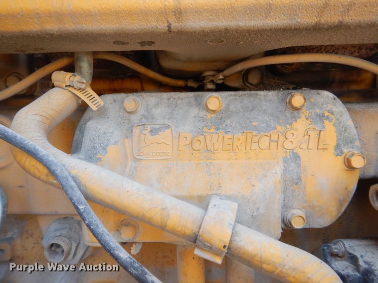 image for item DS8005 1999 John Deere 770CH  motor grader