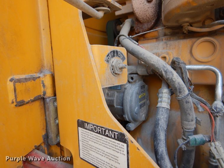 image for item DS8005 1999 John Deere 770CH  motor grader