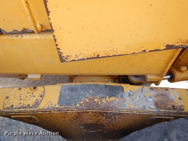 image for item DS8005 1999 John Deere 770CH  motor grader