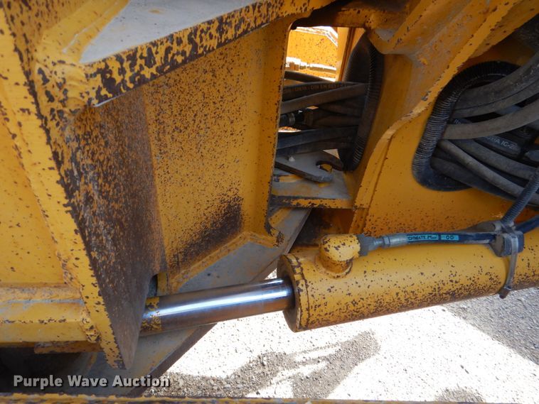 image for item DS8005 1999 John Deere 770CH  motor grader