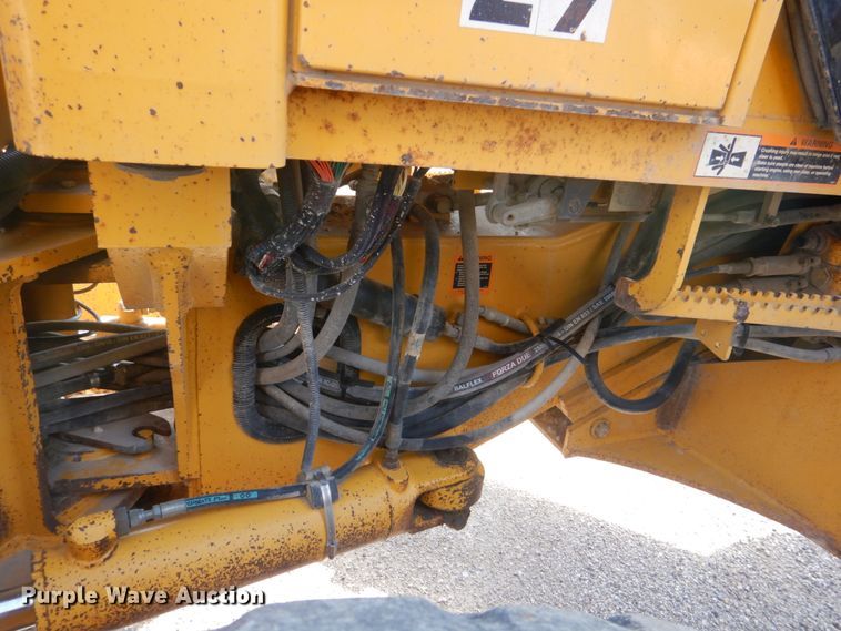 image for item DS8005 1999 John Deere 770CH  motor grader