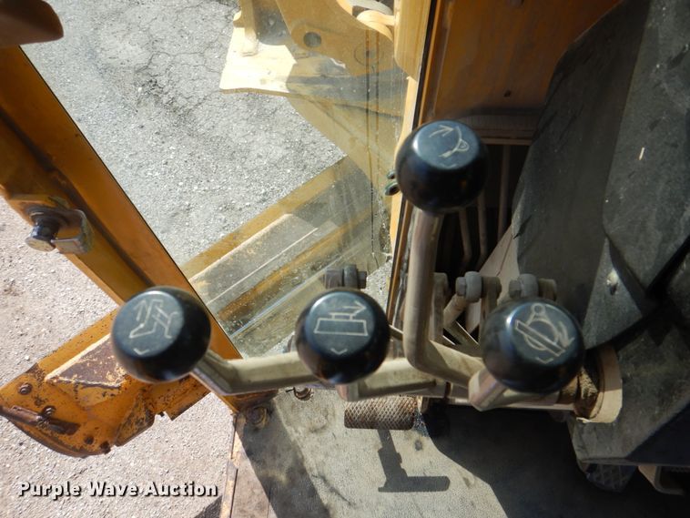 image for item DS8005 1999 John Deere 770CH  motor grader