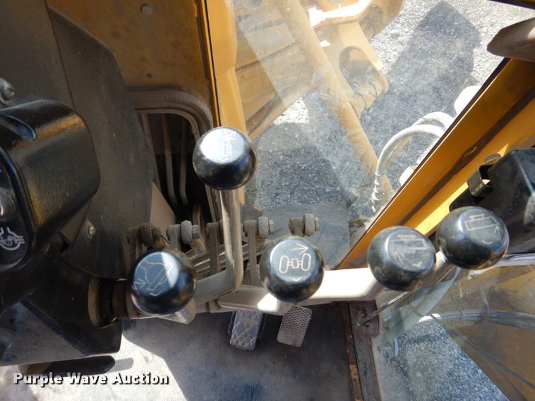 image for item DS8005 1999 John Deere 770CH  motor grader