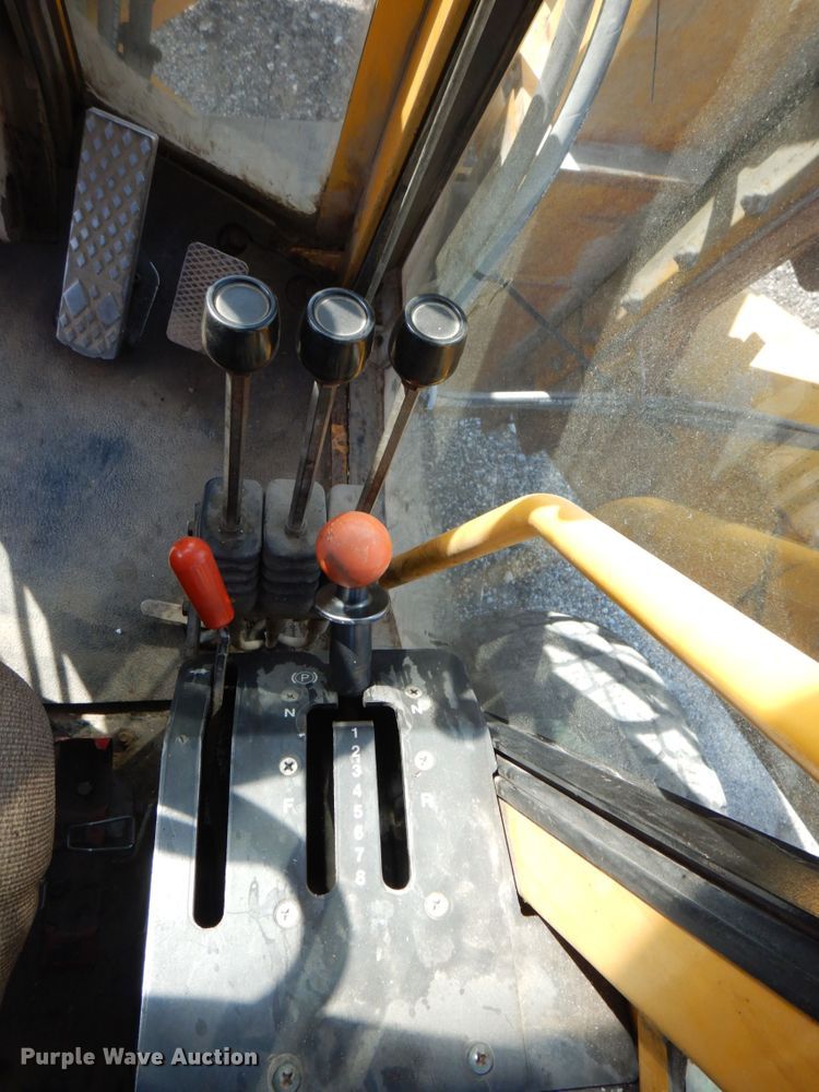 image for item DS8005 1999 John Deere 770CH  motor grader