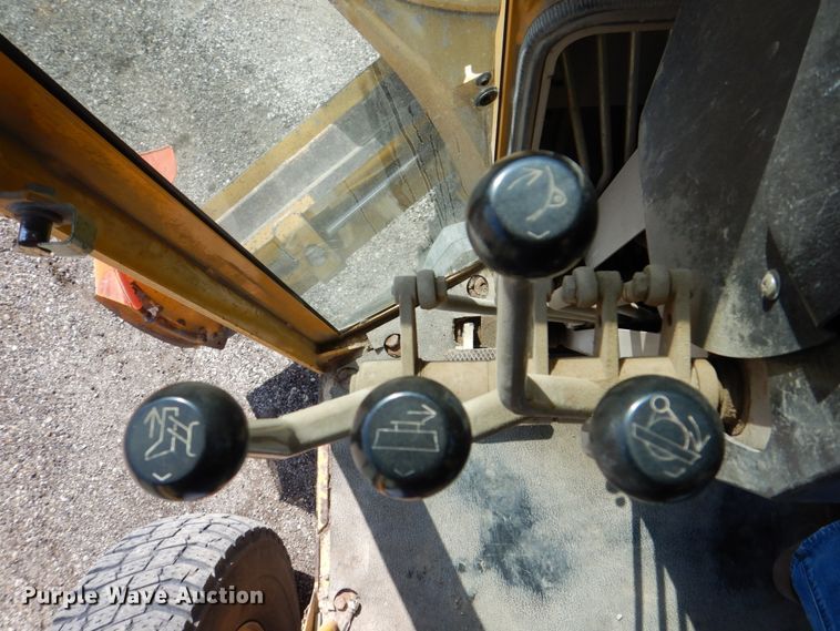 image for item DS8006 1999 John Deere 770CH  motor grader