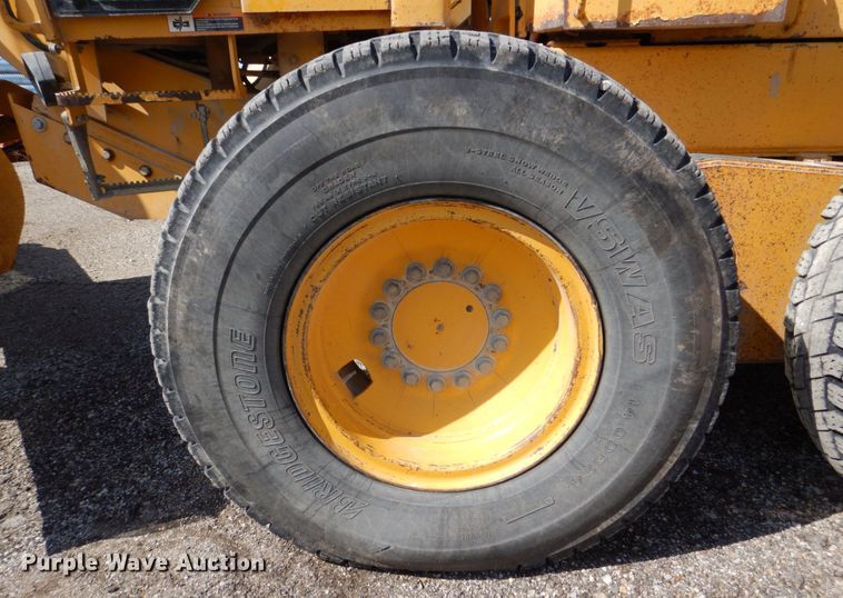 image for item DS8006 1999 John Deere 770CH  motor grader