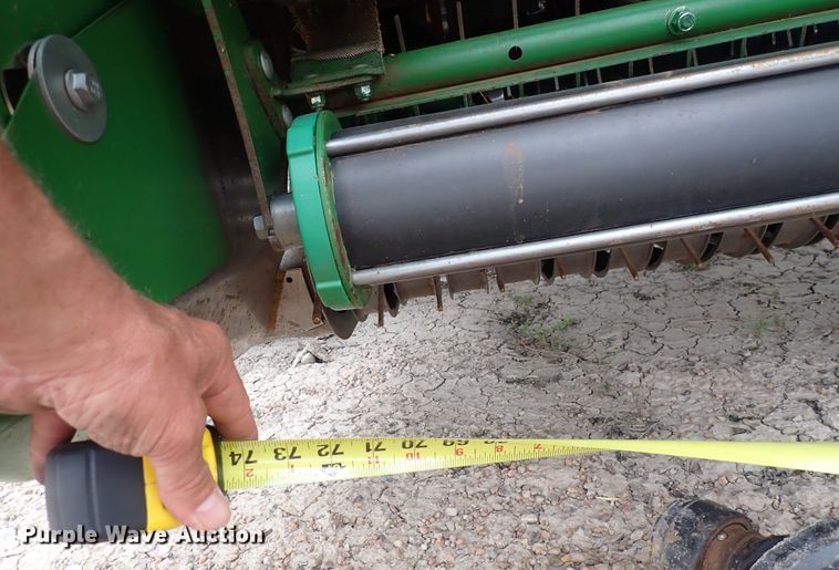 image for item DI1954 John Deere 560R  round baler