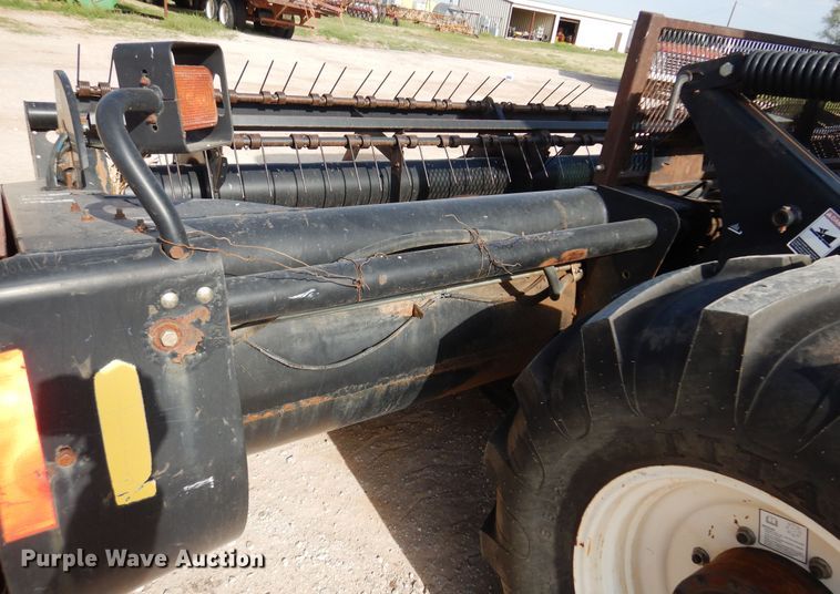 image for item DK0836 2002 MacDon 9352  windrower