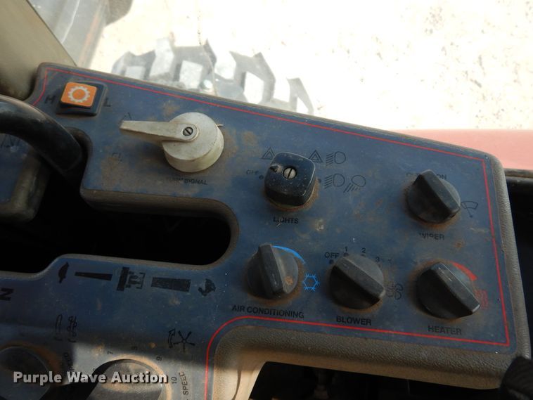 image for item DK0836 2002 MacDon 9352  windrower