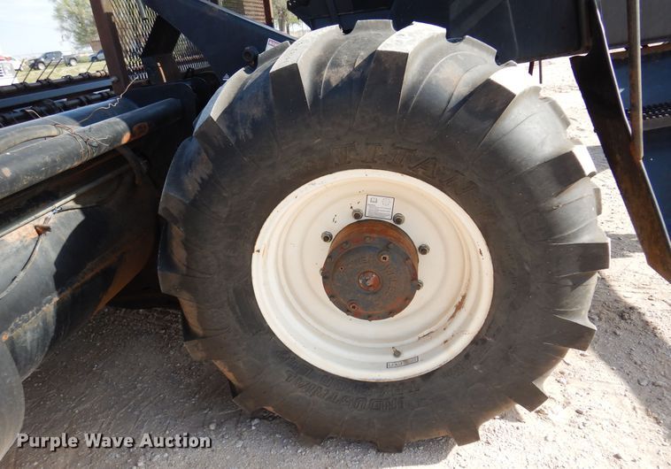 image for item DK0836 2002 MacDon 9352  windrower