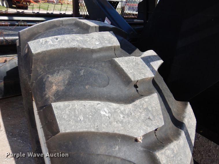 image for item DK0836 2002 MacDon 9352  windrower