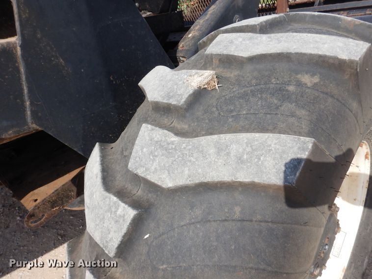 image for item DK0836 2002 MacDon 9352  windrower