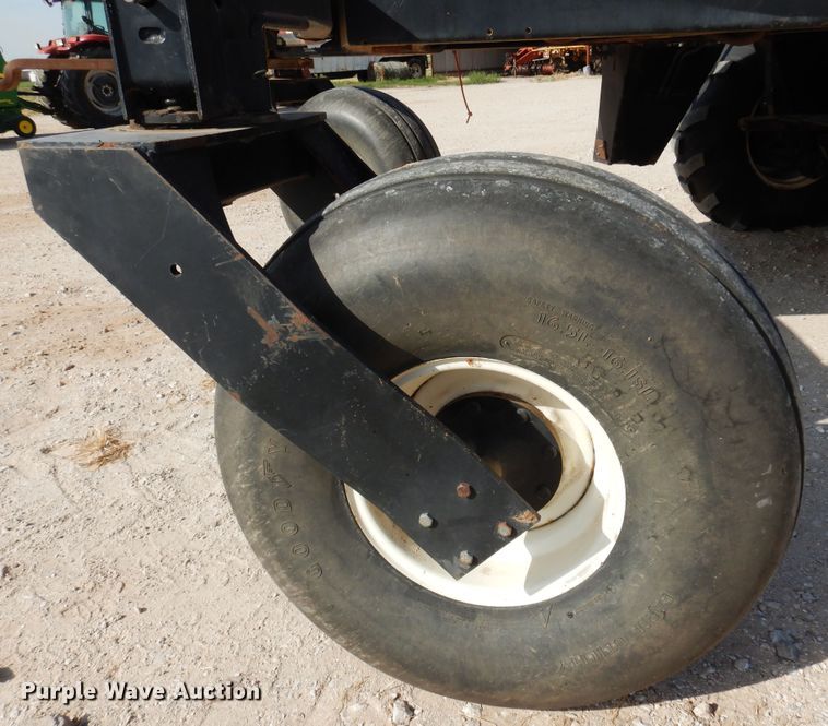 image for item DK0836 2002 MacDon 9352  windrower