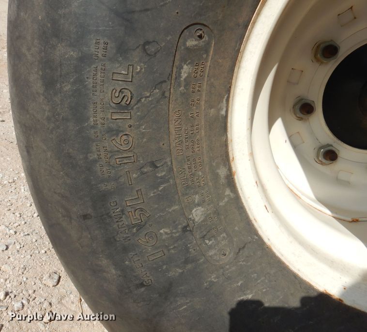 image for item DK0836 2002 MacDon 9352  windrower