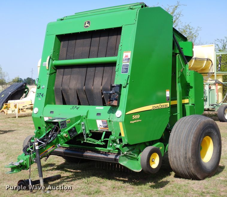 image for item JR9571 2014 John Deere 569  round baler