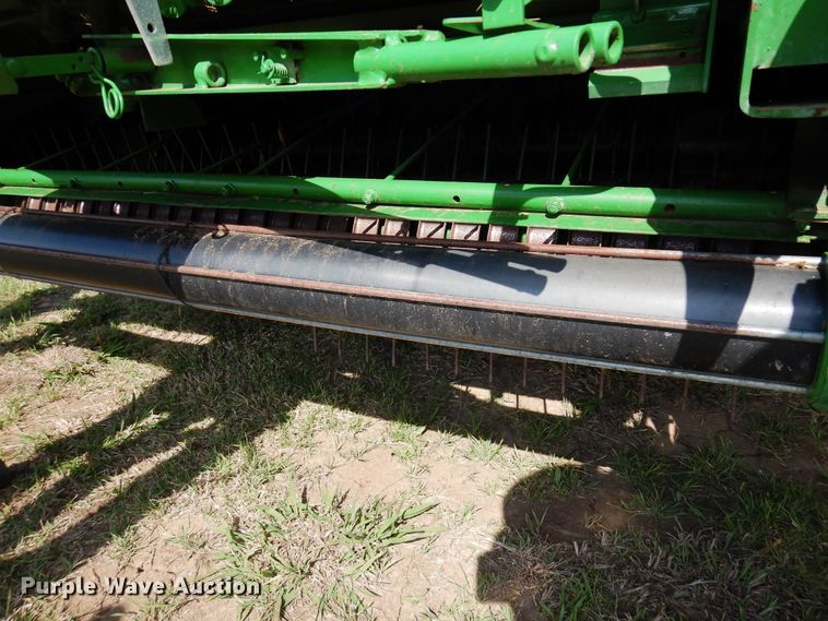 image for item JR9571 2014 John Deere 569  round baler