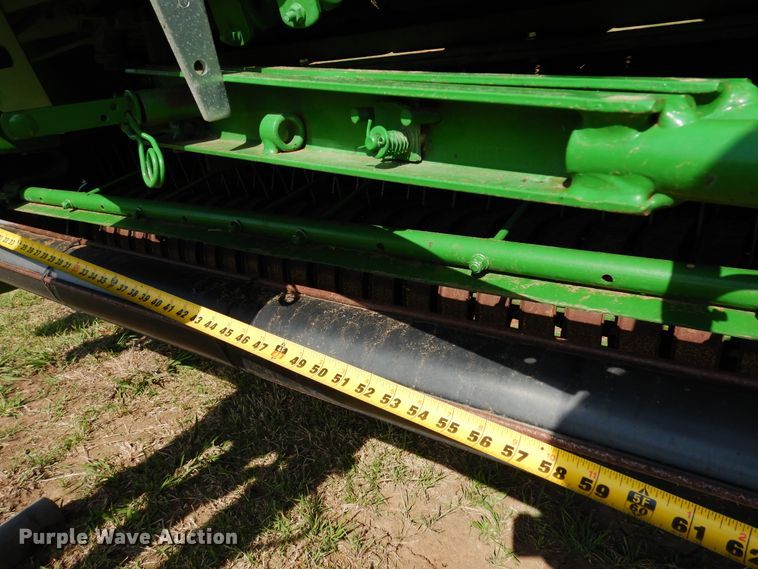 image for item JR9571 2014 John Deere 569  round baler