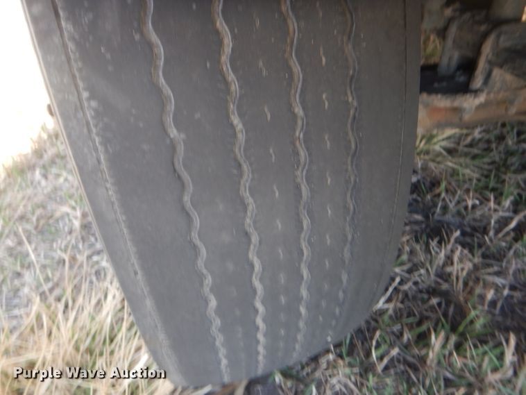 image for item DJ1253 2010 Freightliner Cascadia 113  semi truck