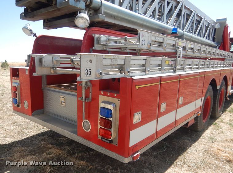 image for item DJ1299 1975 Sutphen TS85  aerial platform fire truck
