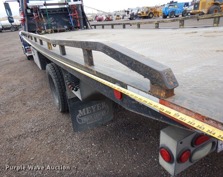 image for item DR1160 2006 Freightliner M106  rollback truck