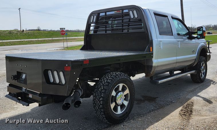 image for item KE9781 2011 Ford F350 Super Duty Lariat  Crew Cab flatbed pickup truck