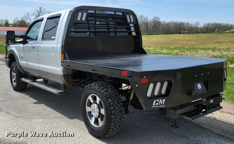 image for item KE9781 2011 Ford F350 Super Duty Lariat  Crew Cab flatbed pickup truck