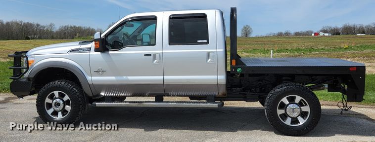 image for item KE9781 2011 Ford F350 Super Duty Lariat  Crew Cab flatbed pickup truck
