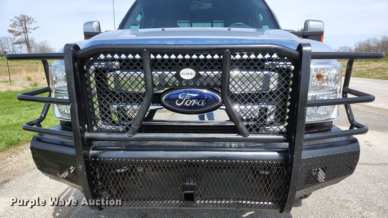 image for item KE9781 2011 Ford F350 Super Duty Lariat  Crew Cab flatbed pickup truck