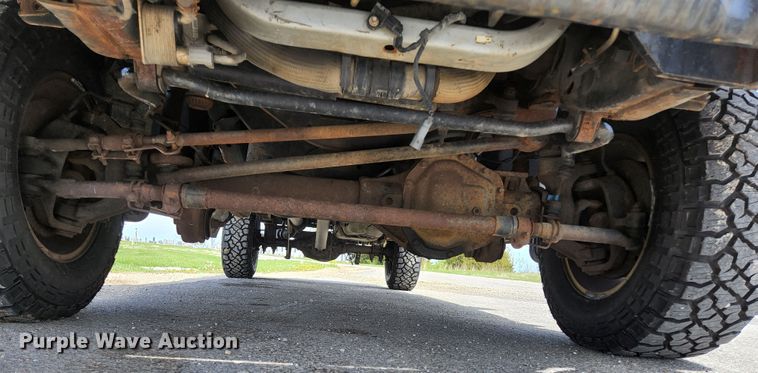 image for item KE9781 2011 Ford F350 Super Duty Lariat  Crew Cab flatbed pickup truck