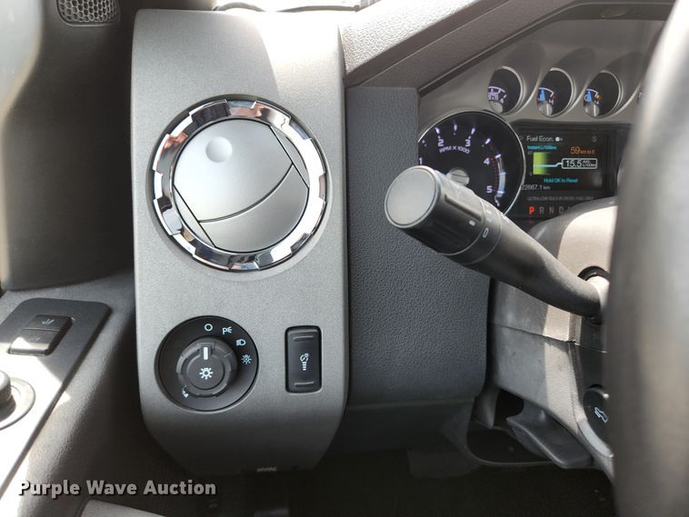 image for item KE9781 2011 Ford F350 Super Duty Lariat  Crew Cab flatbed pickup truck