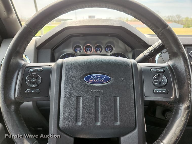 image for item KE9781 2011 Ford F350 Super Duty Lariat  Crew Cab flatbed pickup truck