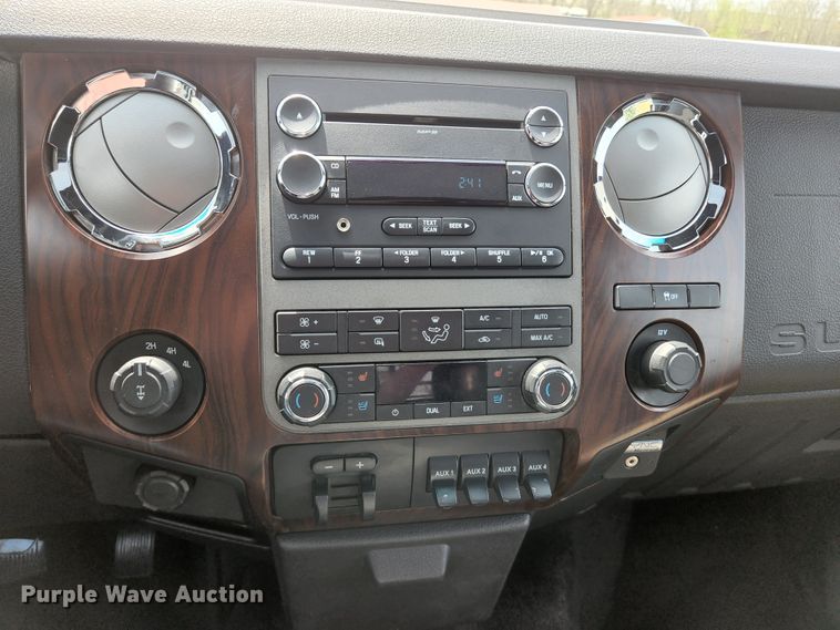 image for item KE9781 2011 Ford F350 Super Duty Lariat  Crew Cab flatbed pickup truck