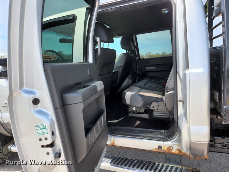 image for item KE9781 2011 Ford F350 Super Duty Lariat  Crew Cab flatbed pickup truck