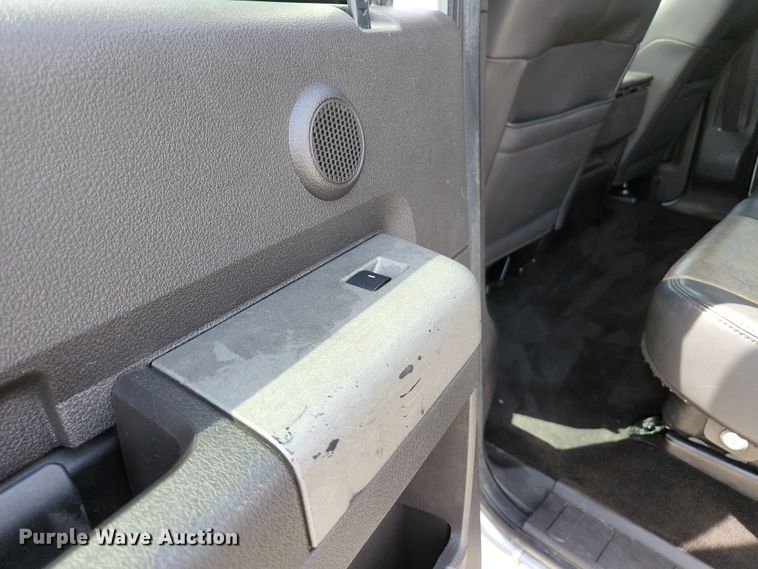 image for item KE9781 2011 Ford F350 Super Duty Lariat  Crew Cab flatbed pickup truck