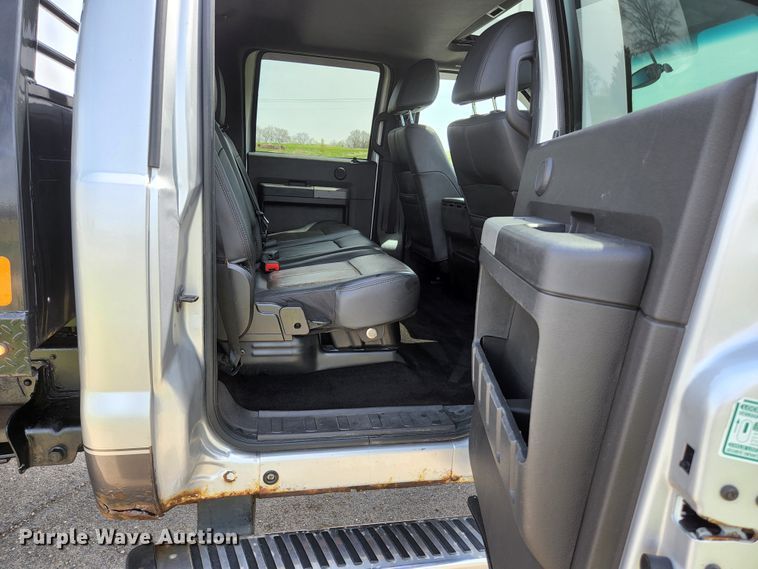 image for item KE9781 2011 Ford F350 Super Duty Lariat  Crew Cab flatbed pickup truck