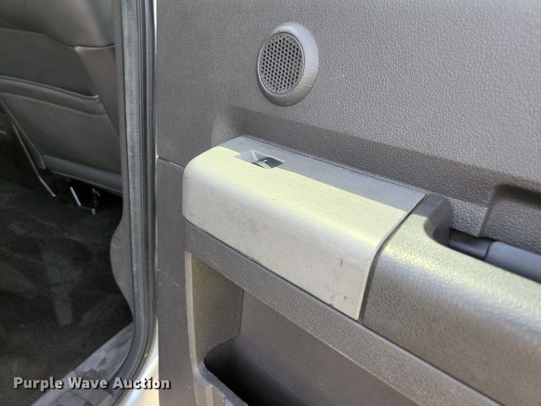 image for item KE9781 2011 Ford F350 Super Duty Lariat  Crew Cab flatbed pickup truck