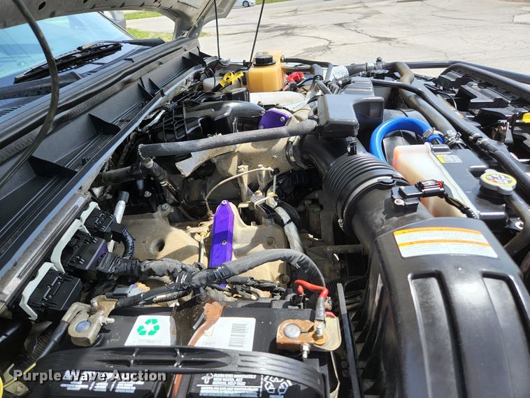 image for item KE9781 2011 Ford F350 Super Duty Lariat  Crew Cab flatbed pickup truck