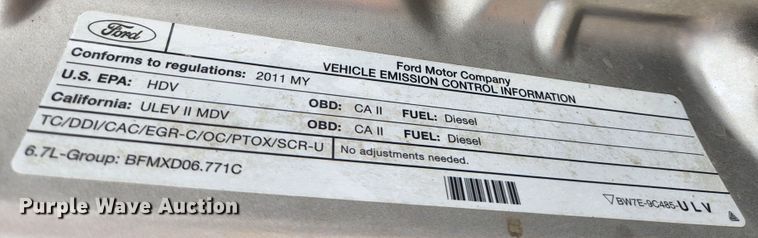 image for item KE9781 2011 Ford F350 Super Duty Lariat  Crew Cab flatbed pickup truck