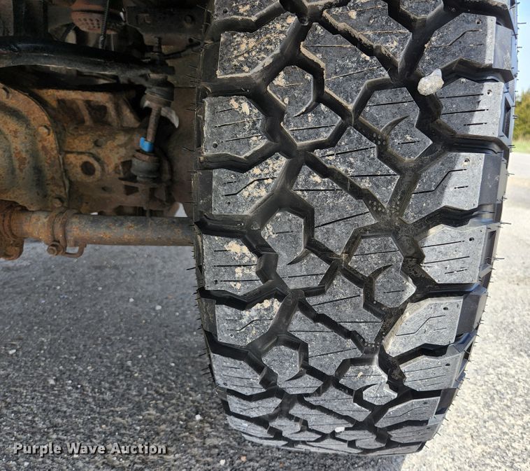 image for item KE9781 2011 Ford F350 Super Duty Lariat  Crew Cab flatbed pickup truck