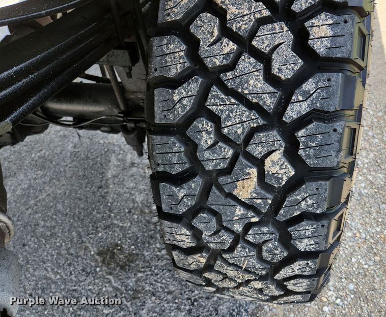 image for item KE9781 2011 Ford F350 Super Duty Lariat  Crew Cab flatbed pickup truck